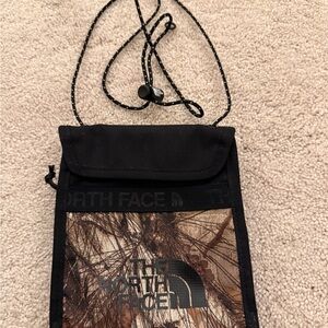 The North Face Black and Brown Camouflage Pouch